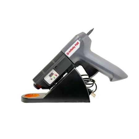 Corded black and gray PUR hot melt applicator sitting on stand