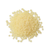 Pile of Pale Amber TEC Bond 214B Hot Melt Pellets