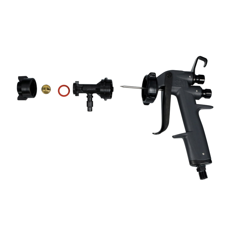 3M Water-Based Spray Gun and parts laid out for assembly showing nozzle, cap, gasket, and tip components.