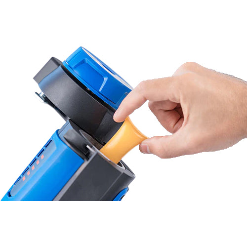 Loading yellow hot melt pillow adhesive into Buehnen HB 720 bead applicator melt tank chamber