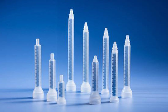 9 static mixer nozzles of different lengths on table