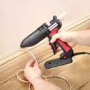 Power Adhesives Tec 806 glue gun used for precise hot melt application on wood trim and flooring installation