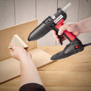Applying hot melt adhesive to a small wood component with a Power Adhesives Tec 830 glue gun