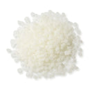 Off-white Tecbond 351B biodegradable EVA hot melt pellets for bulk adhesive applications.