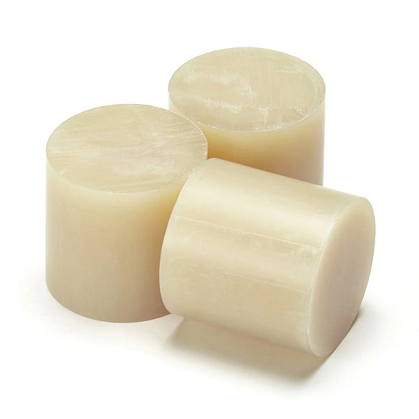 Power Adhesives Tecbond 440B biodegradable hot melt adhesive slugs in a cylindrical shape.