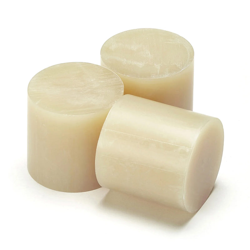 Power Adhesives Tecbond 440B biodegradable hot melt adhesive slugs in a cylindrical shape.
