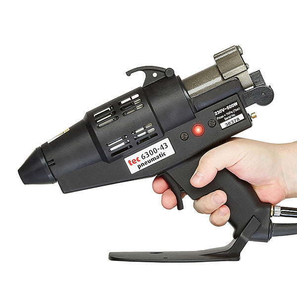 TEC 6300 pneumatic spray glue gun in use