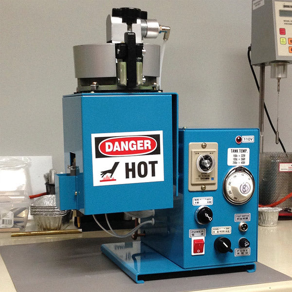 An example of a hot melt adhesive holding tank.